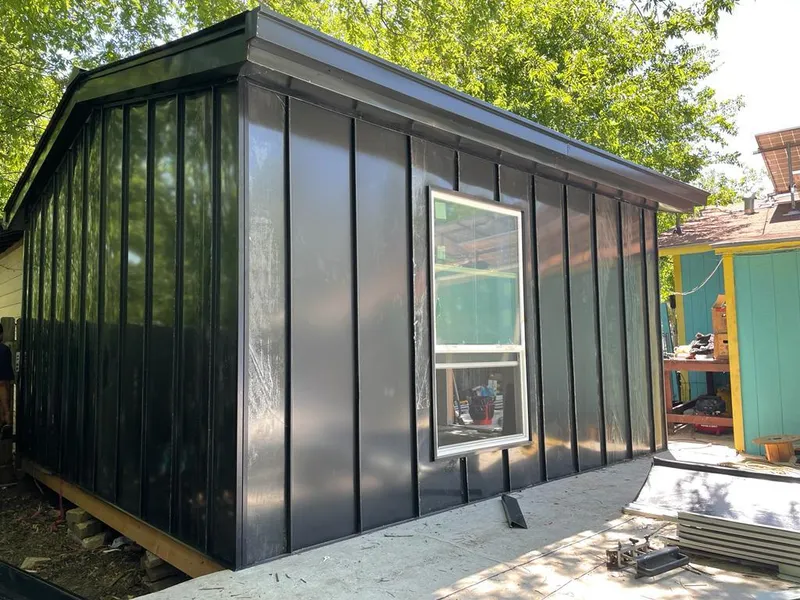 Black standing seam metal wall panels for Roof Inspection in River Rouge